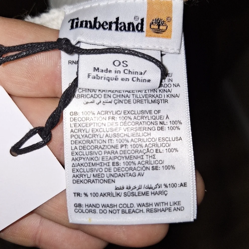 A Timberland white/ lt. brown plaid scarf that's 67